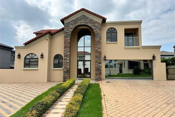 This elegant 4-bedroom home in the prestigious Blue Valley Golf Estate offers a perfect blend of luxury and modern convenience. Each ...