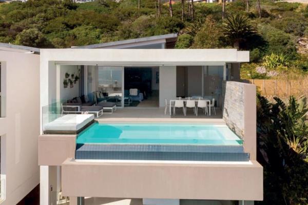 Indulge in the ultimate coastal escape at this stunning Camps Bay villa. With breathtaking ocean views, a private pool, and luxurious ...