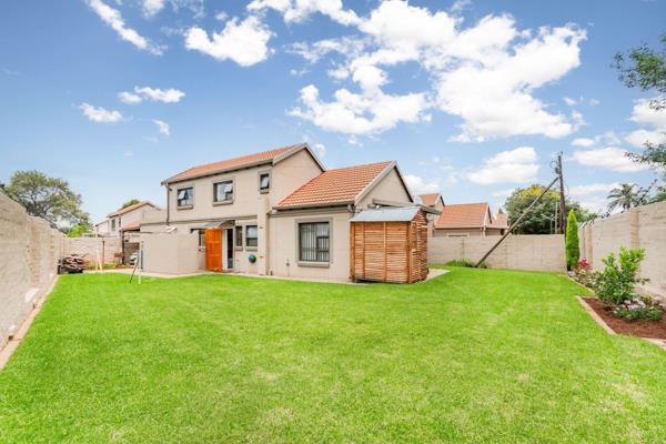 This stunning 4-bedroom corner property is situated in a secure estate and offers a ...