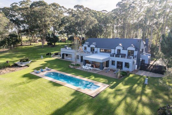 Uniquely appointed Country Residence surrounded by exquisitely landscaped gardens, swan pond, dams and private forested tranquility. ...