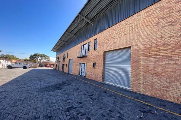 The warehouse features a large high roller shutter door for effortless loading and ...