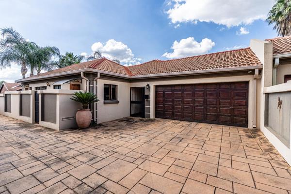 Nestled in the secure Amberfield Crest Estate, this stunning 3-bedroom home offers the ...