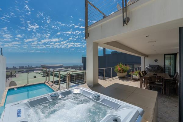 Modern double-story elevated home with spectacular views below Signal Hill.

This stunning three-bedroom, 3 bathroom (all en suite) ...