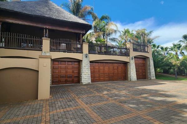 Upon entering through the front door, you are greeted by a spacious entertainment area featuring a built-in braai and bar. The TV room ...