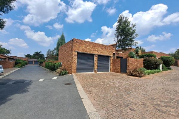 Neat Open-plan living room opens out to paved patio with built-in braai and neat, established garden. Kitchen includes breakfast bar ...