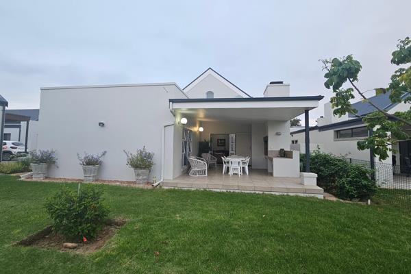 It’s a privilege to present this charming corner home, perfectly situated in a secure and cozy village next to the renowned Breede ...