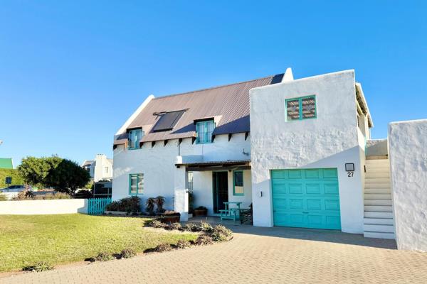 Nestled in the picturesque coastal village of Jacobsbaai, this exceptional property ...