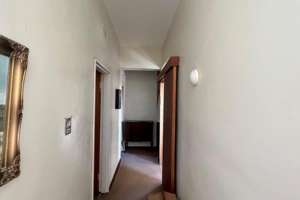 This well-located apartment offers two spacious bedrooms with built-in cupboards, a ...