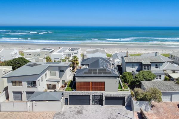 EXQUISITE SEASIDE MASTERPIECE 

This spectacular 4-bedroom, all en-suite residence is a true statement of luxury, offering an unmatched living experience in the heart of Melkbos. Built to the highest standards, this home showcases flawless craftsmanship, bespoke finishes ...