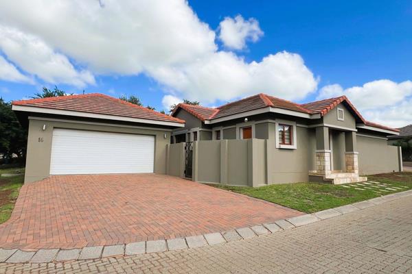 This Modern residential property features an under-counter oven with an extractor fan, tiled floors throughout , blinds, and air ...