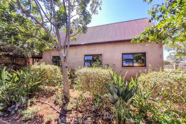 This lovely 3-bedroom townhouse is located in The Village in Hoedspruit Wildlife Estate. 

The townhouse is set amongst beautiful trees ...