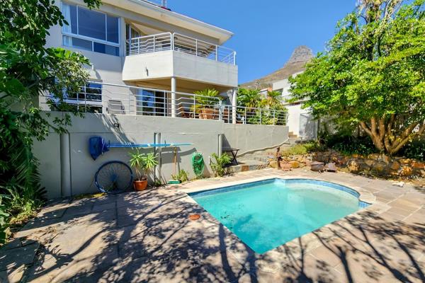 Located in prestigious wind free Fresnaye, one of Cape Town’s most sought after neighborhoods. This 5 bedroom family home has ...