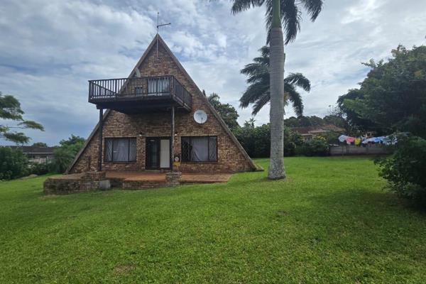 Nestled in the peaceful neighborhood of Margate Ext 3, this delightful A-frame home ...