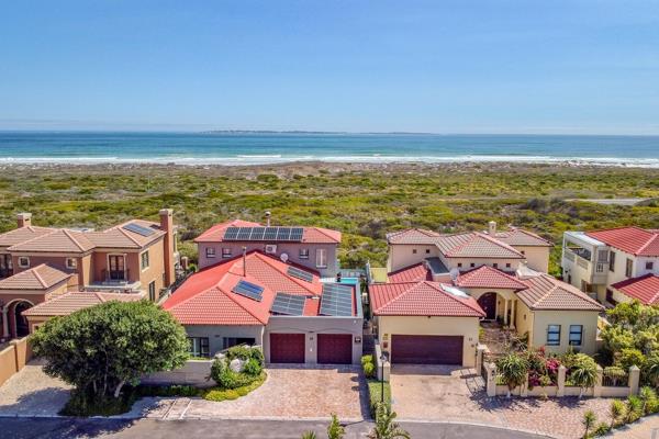 A Crown Jewel with Iconic Table Mountain and Ocean Views

Discover the pinnacle of luxury in this exquisite seaside masterpiece, perfectly positioned on the front row of an exclusive estate within the serene Blouberg Nature Reserve. From the moment you arrive, the ...