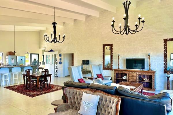 Nestled in the exclusive Stilbaai Dunes Development, this exquisite coastal retreat ...