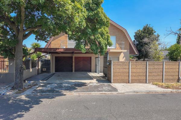 This double-story home has so much to offer! Downstairs you will find a separate dining ...