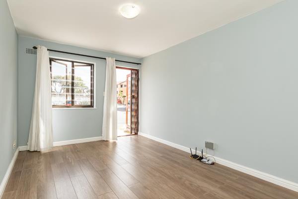 Welcome to your move-in ready first home! This modern, ground-floor unit requires no ...