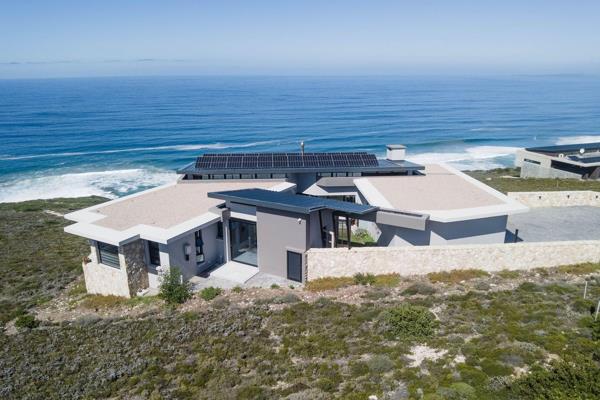 Nestled in the prestigious Breaker Point Coastal Estate, this exquisite luxury home offers an unmatched fusion of modern elegance and ...