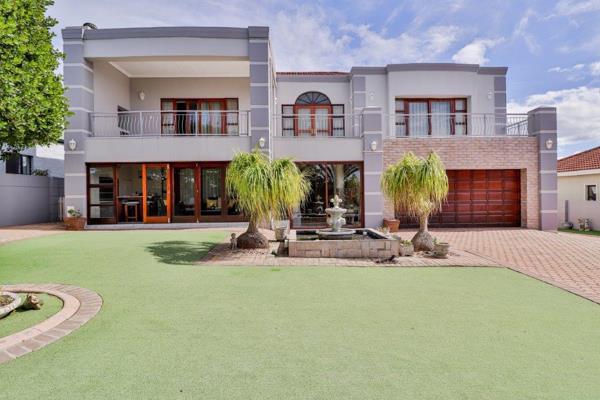 Welcome to a residence that truly elevates everyday living — where timeless elegance ...