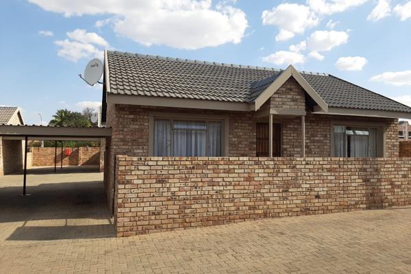 Spacious open plan living area/kitchen with ample cupboards and gas stove.  2 Bedrooms with build-in cupboards. 1 Full bathroom with ...