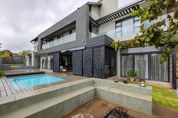 This modern and beautifully finished five-bedroom home is tucked away in the exclusive game reserve section of The Hills Game Reserve ...