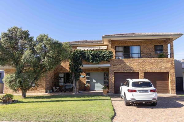 Low maintenance face brick home located within a two-minute stroll to the beach, for ...