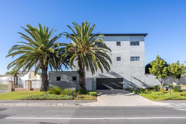 This move-in ready, end-unit apartment is set in a quiet block of just 14 units and ...