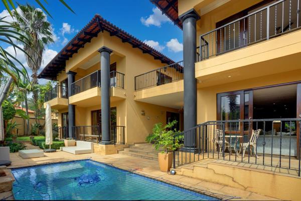 Welcome to a home that embodies luxury, comfort, and timeless design. When you enter through the grand double-volume entrance, framed ...