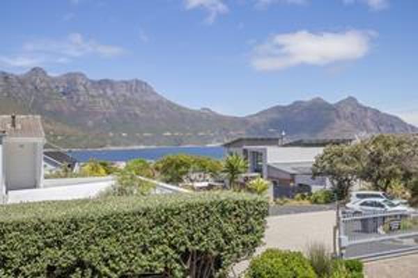 Enjoy breathtaking mountain and ocean views from this charming townhouse, designed for easy, secure living. Perfect for those seeking a ...
