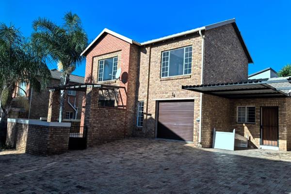 3 Bedroom unit with staff Quarters , single garage ans own garden in secure complex 
