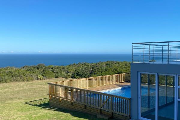 Nestled in the heart of South Africa’s breath taking Garden Route, this modern coastal home offers uninterrupted 180&#176; ocean views ...