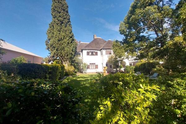 Step back in time with this grand old home full of character and charm. Boasting ...