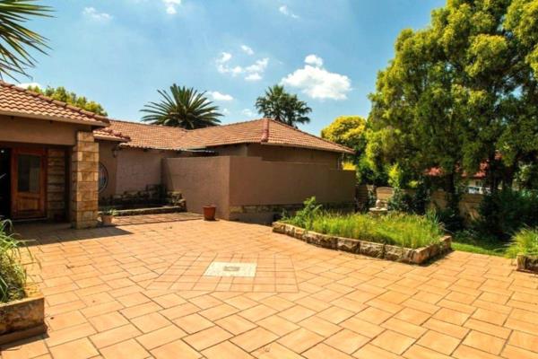Welcome to this family oasis, situated in the heart of Atlasville, Boksburg,  this property boasts 1 230 m2 of yard space with an ...