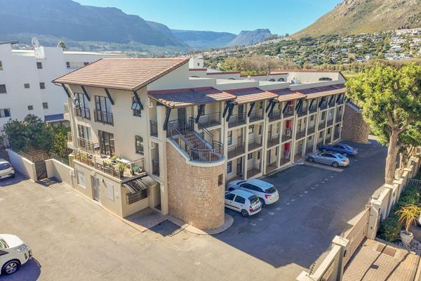 This beautifully maintained apartment is tucked away in a well-managed complex in the charming and sought-after village of Hout Bay.  ...