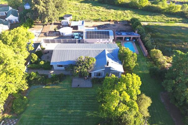 This lovely 4-bedroomed home has modern kitchen and  lovely bathrooms.   3 of the 4 bedrooms have built-in cupboards.  A large open ...