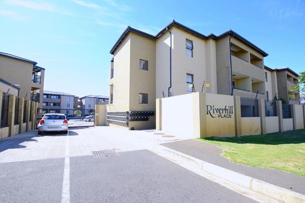 Welcome to this stylish and well-maintained first-floor apartment located in the secure and popular Riverhill Place complex in the ...