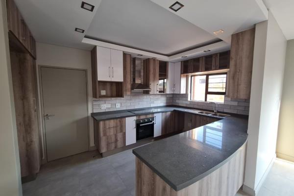Nestled in the vibrant Bendor neighborhood, this modern three-bedroom townhouse ...