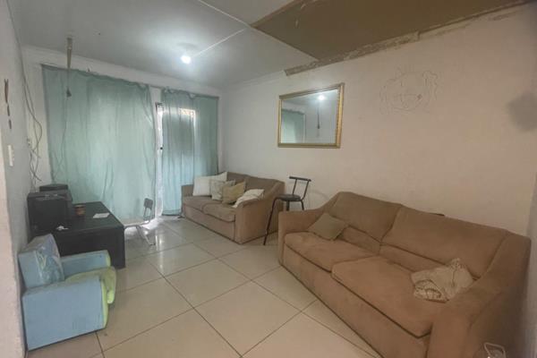 Looking for a project in a great spot with outdoor space? This 3-bedroom house in Lentegeur is waiting for you to bring it to ...