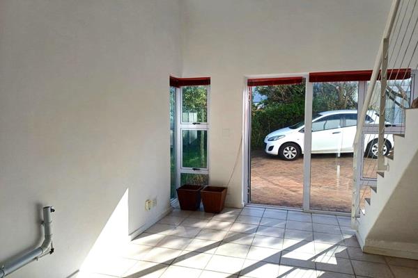 This airy, sun-filled apartment features a large loft and high-volume ceilings. Ground ...