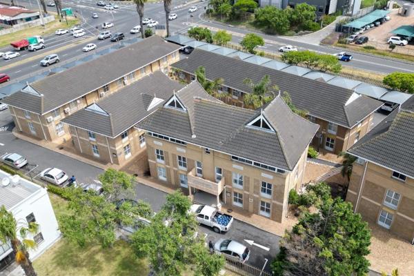 This 65m&#178; second-floor sectional title office in Midpark Business Village presents ...