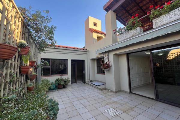 This elegant two-level Spanish-style home is located in a secure estate in Waterkloof. It features two en-suite bedrooms, a guest ...