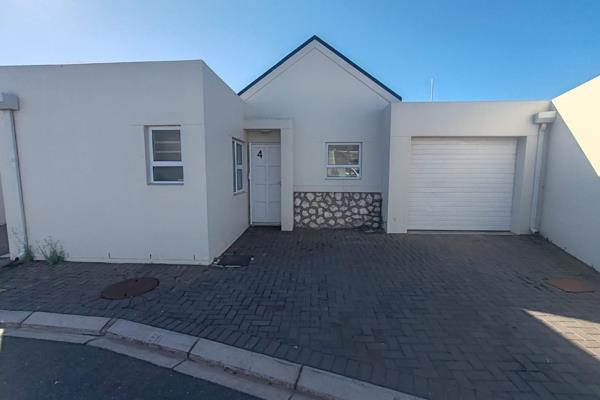 Nestled in a quiet cul-de-sac within a secure gated estate, this cozy 2-bedroom townhouse offers the perfect blend of comfort ...