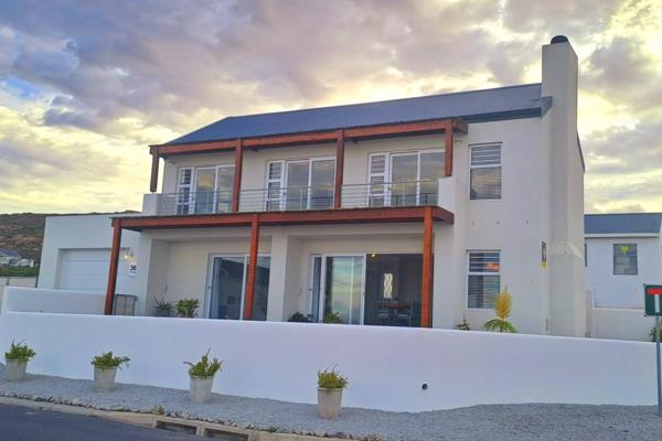 Presenting &quot;Shimmer of the Ocean,&quot; an exquisite house for sale in the sought-after St Helena Views, where panoramic sea views ...