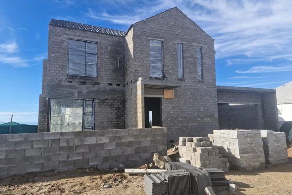 This stunning home, still under construction but nearing completion, is located in the ...