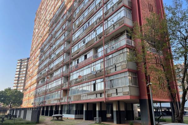 2 bedroom flat located in the heart of Sunnyside. The unit is fully tiled, features a ...