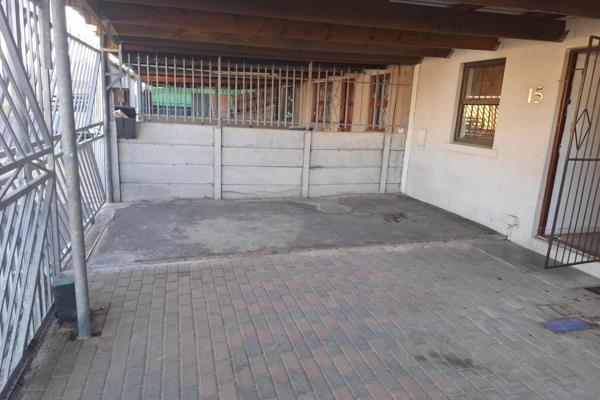 The home offers safe and secure parking behind gates. The living area is open plan to the kitchen with ample cupboard space, two ...