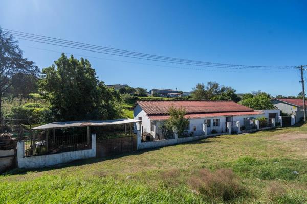 A sunny 4 bedroom, 2 bathroom family home waiting to welcome your family.  The kitchen walks out onto a wooden deck overlooking the ...