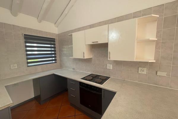 This property is situated in a secure complex within a boomed off area of Lakefield. 
The unit features double volume ceilings with ...