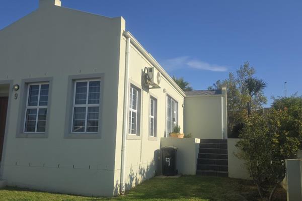 Nestled in a quiet corner, this north-facing home boasts a spacious garden perfect for ...