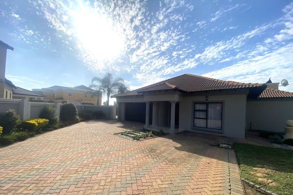 A contemporary and sophisticated family home offering space and luxury - uniting a modern look-and-feel with a warm, inviting ...
